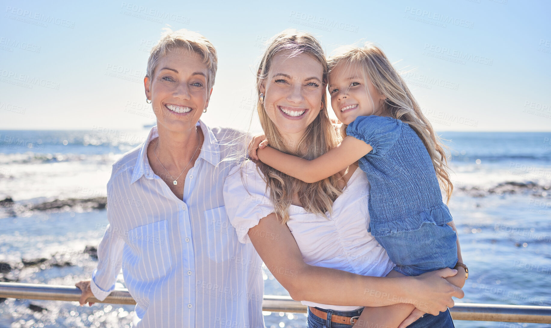 Buy stock photo Portrait, beach and grandmother with mama, girl and time together for vacation, family and water. Seaside, women or group with summer holiday, generations and travel with happiness, cheerful and love