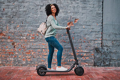 Buy stock photo Black woman, electric and scooter in city with smile, happy and relax for summer day, edgy and trendy on sidewalk. Yong female, girl and eco friendly transportation have fun, cheerful and in street.