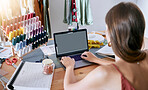 Fashion, clothes and digital designer woman working on a computer planning clothing production. Online, web and textile design of a seamstress, tailor and stylist employee in a creative work studio