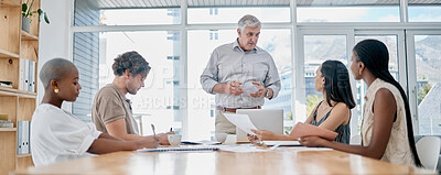 Buy stock photo Meeting, coaching and education with a business man manager and his team in the boardroom for planning or strategy. Leadership, management or teamwork with a senior male leader and employee group