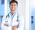 Portrait of a young male doctor in healthcare internship opportunity, career and happy hospital service. Face or headshot of a proud medical person, cardiologist or man with leadership and integrity