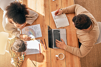 Buy stock photo Above, family and homework with remote work at a table for learning, business and busy together. Care, house and father, child and mother with laptop, teaching and help with education by parents