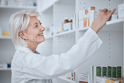 Buy stock photo Happy senior woman, pharmacist and inventory on shelf for inspection or checking stock at drugstore. Mature female medical or healthcare professional smile in medication or pharmaceutical at pharmacy