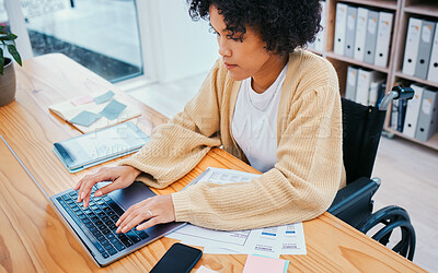 Buy stock photo Office, laptop and woman in wheelchair typing at a desk with company report and internet research. Online, computer and female person with a disability and web work on a website with app analysis