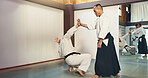 Sensei, students and fight, aikido for fitness and martial arts training class with self defense and discipline. Combat, education and black belt with Japanese men and workout for exercise in dojo
