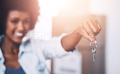 Buy stock photo African woman, keys and new home with cardboard, moving or homeowner on real estate, apartment or house. Female person, excited for property, investment or security for mortgage, freedom and success