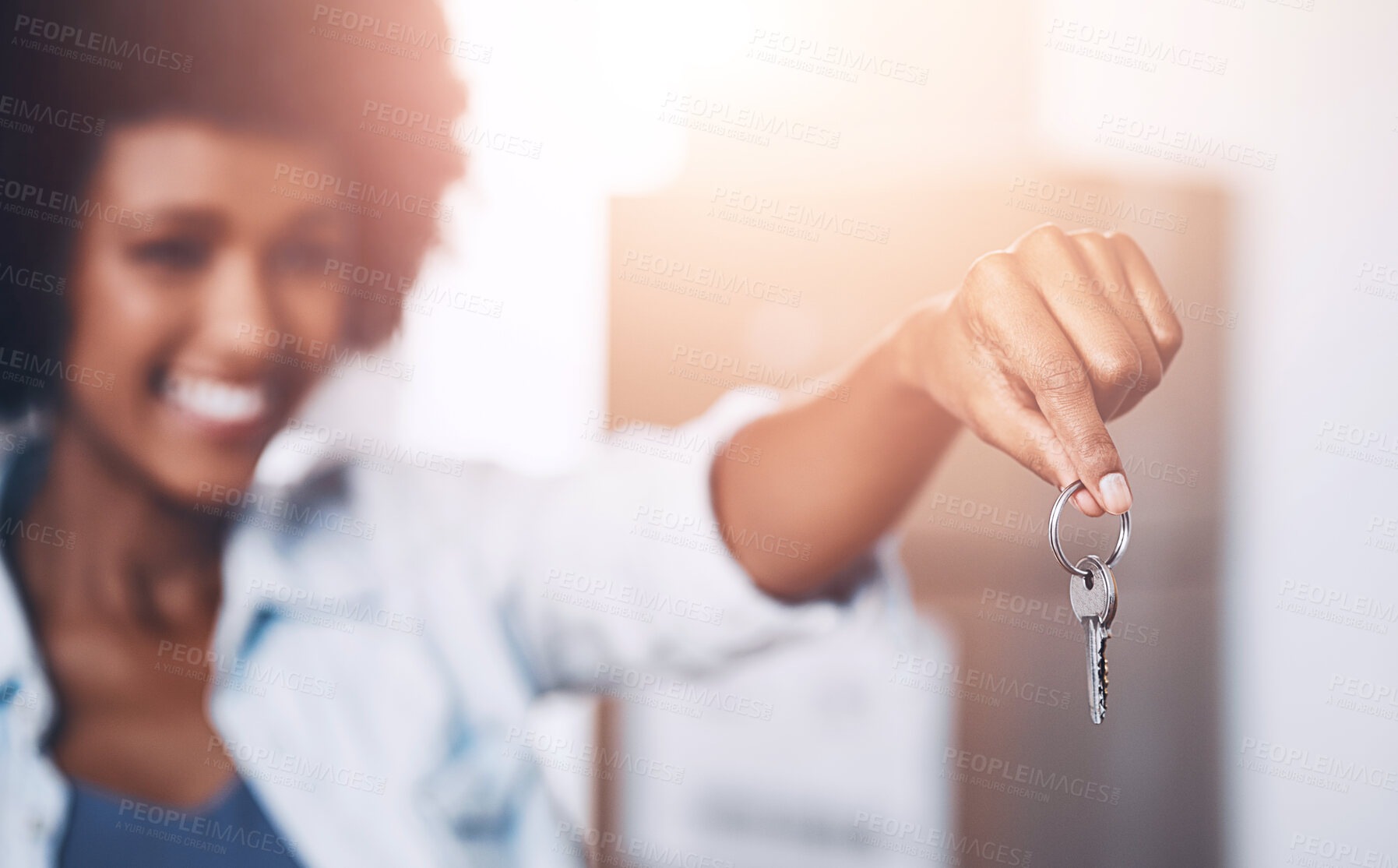 Buy stock photo African woman, keys and new home with cardboard, moving or homeowner on real estate, apartment or house. Female person, excited for property, investment or security for mortgage, freedom and success