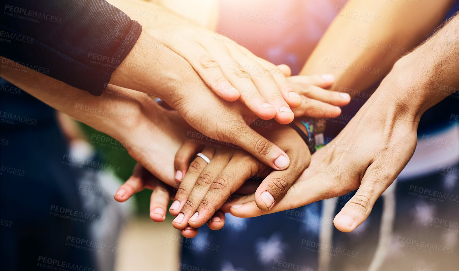 Buy stock photo Team building, stack hands and people outdoor for celebration, success or motivation. Group, friends and huddle together closeup for solidarity of community with trust, connection or support for goal