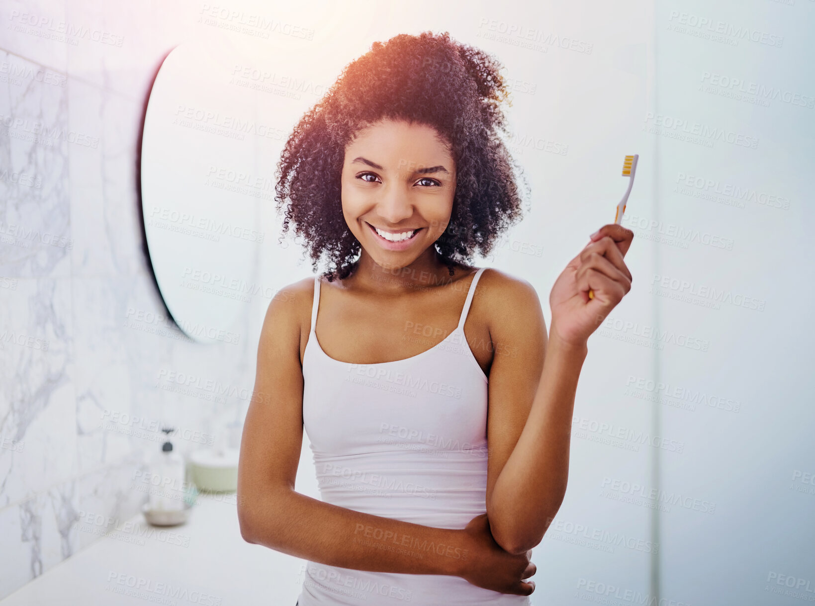 Buy stock photo Portrait, smile and African woman with toothbrush for dental hygiene, wellness or morning routine. Face, teeth and oral health of girl in bathroom for orthodontics, cleaning and fresh breath in home