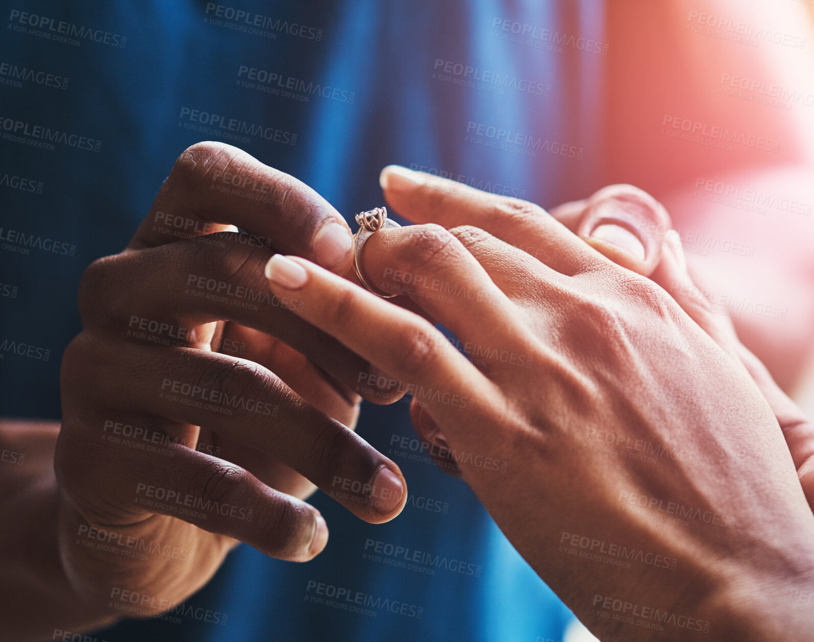 Buy stock photo Couple, hands and wedding ring for proposal, love or commitment promise together in closeup. Finger, asking or people putting diamond jewelry or accessory on fiance for engagement, romance or care