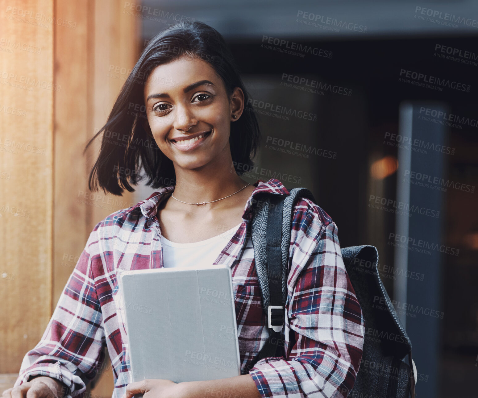 Buy stock photo Indian girl, student and portrait on campus with tablet for online learning, studying or education at university. Person, happy or backpack with digital tech for info, college scholarship or research