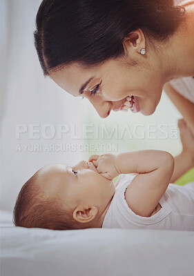 Buy stock photo Happy mother, baby and bonding with care on bed for love, motherhood or childhood at home. Mom with smile and playing with little child, newborn or infant in bedroom for holiday or weekend at house