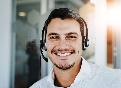 Buy stock photo Call center, portrait and man in office with smile for customer service, technical support or communication. Lens flare, CRM and agent with headset for consultation, help desk or remote assistance