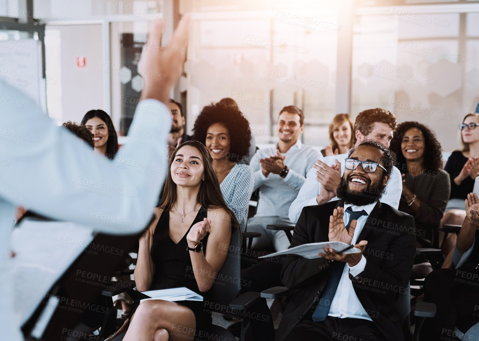 Buy stock photo People, speaker and applause at workshop in office for training, support for company conference or event. Celebrate, inclusion presentation and corporate award for team building with staff at seminar