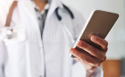 Buy stock photo Healthcare, doctor and hand with phone in hospital for medicine research, information and communication. Oncology, professional and person with tech for telehealth, network and online medical news