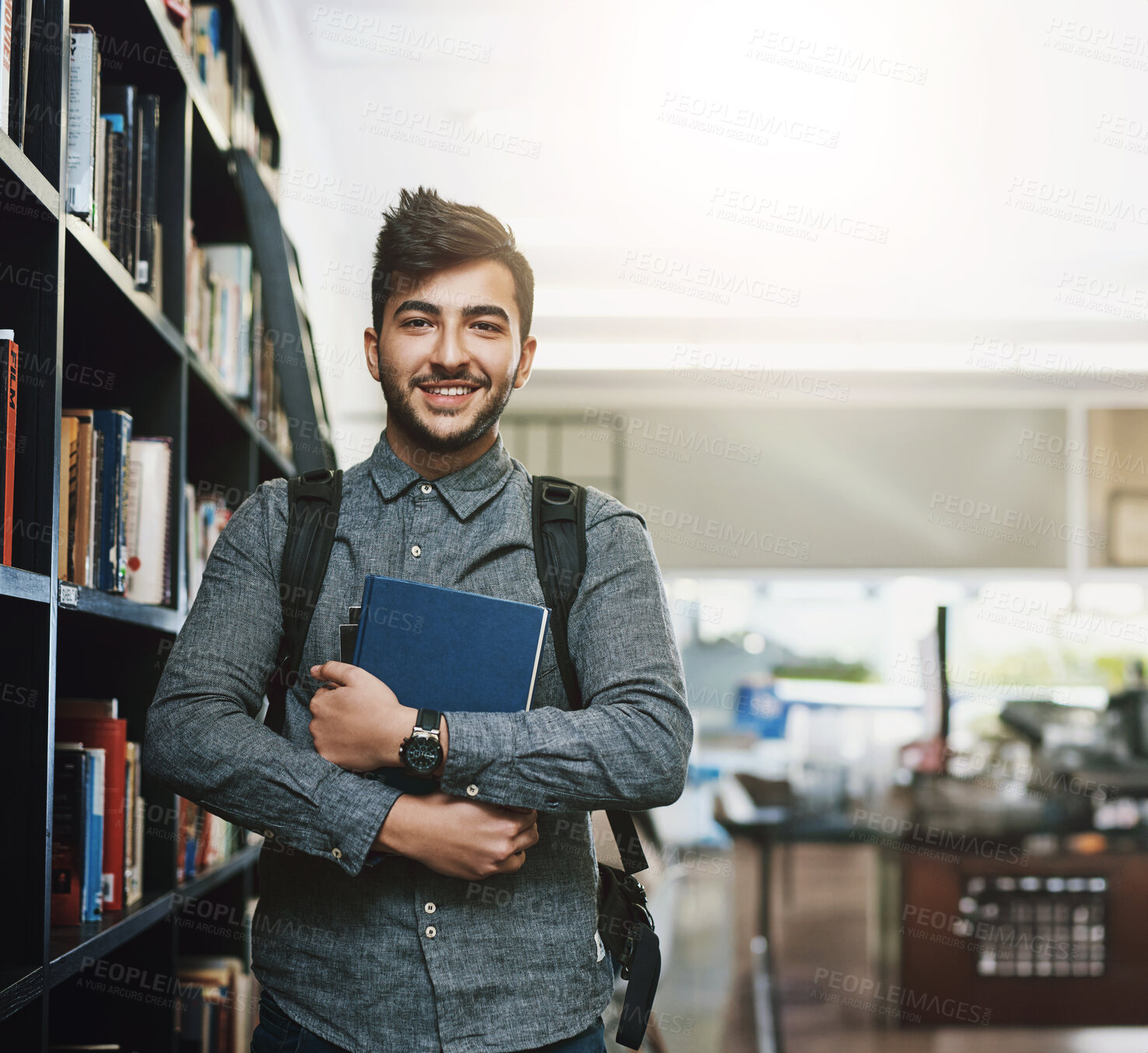 Buy stock photo College, library and portrait of man with books for higher education, knowledge and development. Student, scholarship and shelf with study paper at campus for project information, learning and growth