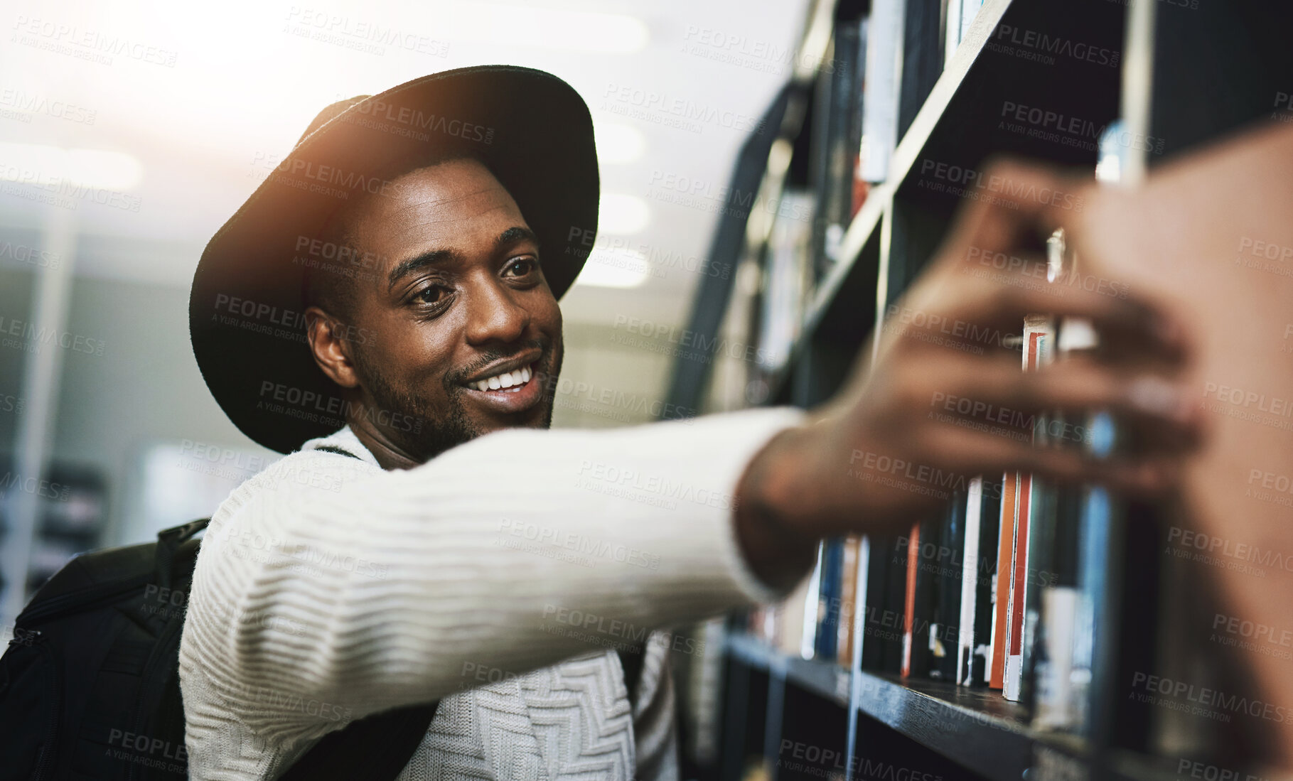 Buy stock photo Find, shelf or black man with book in library with smile for education, opportunity or studying at college. Looking, school and happy student for research, knowledge and scholarship at university