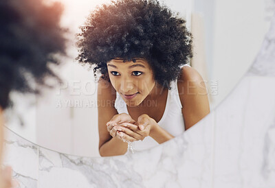 Buy stock photo African woman, mirror and wash face in bathroom with water for beauty, skincare and wellness. Happy girl, reflection and cleaning facial in home with liquid as morning routine for skin glow or shine