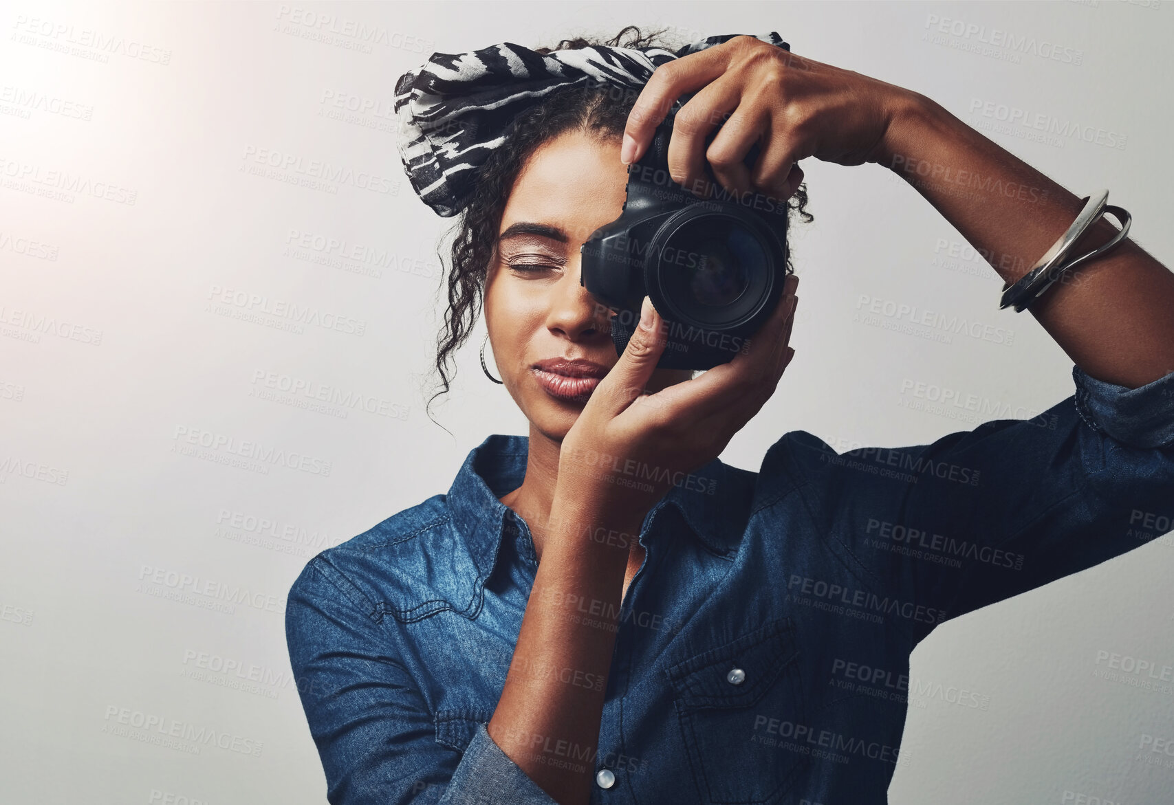 Buy stock photo Camera, woman and paparazzi in studio with creative photography career for media press. Art, job and female photographer from Brazil with dslr equipment for magazine photoshoot by gray background.