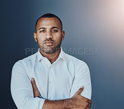 Buy stock photo Portrait, financial advisor and businessman with arms crossed in studio for corporate career or job in France. Face, confident or proud professional investment banker with ambition on blue background