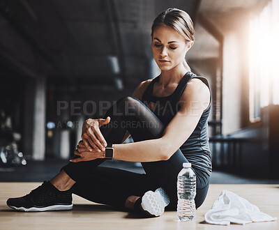 Buy stock photo Rest, fitness and woman in gym with water for training, exercise and cardio workout. Sports, athlete and person on floor for calm, relax and on break for wellness, health and performance with bottle