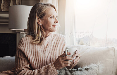 Buy stock photo Mature woman, coffee and morning on sofa by window with smile for thinking, memory or insight in home. Person, tea cup and happy on lounge couch, remember and relax with nostalgia at house in Berlin