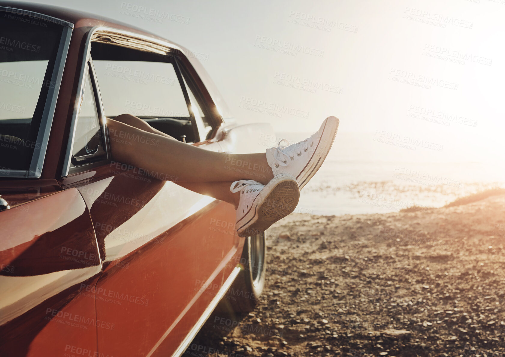 Buy stock photo Car, legs and road trip with person at beach to relax on holiday for travel or summer vacation. Nature, sky and view with person outdoor on coast by ocean or sea for adventure, getaway or journey