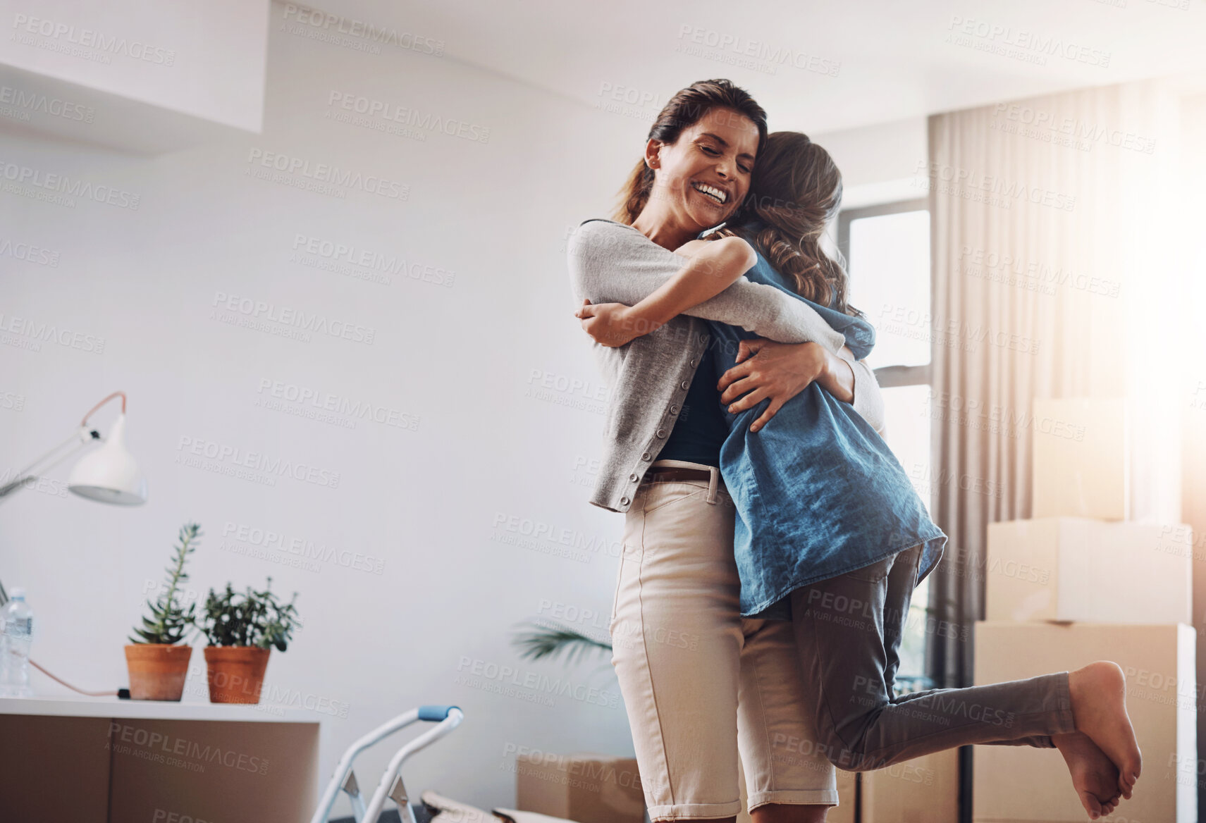 Buy stock photo New home, mom and hug kid to celebrate house sale, mortgage and property investment. Mother, girl and embrace child for real estate, relocation and success of happy family moving to dream apartment