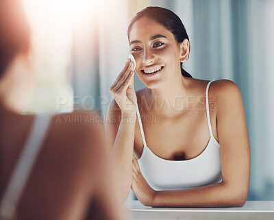 Buy stock photo Woman, mirror and cotton pad in bathroom for skincare, toner and cleaning acne or pimple breakout. Female person, reflection and skin in house for facial treatment and dermatology after microneedling