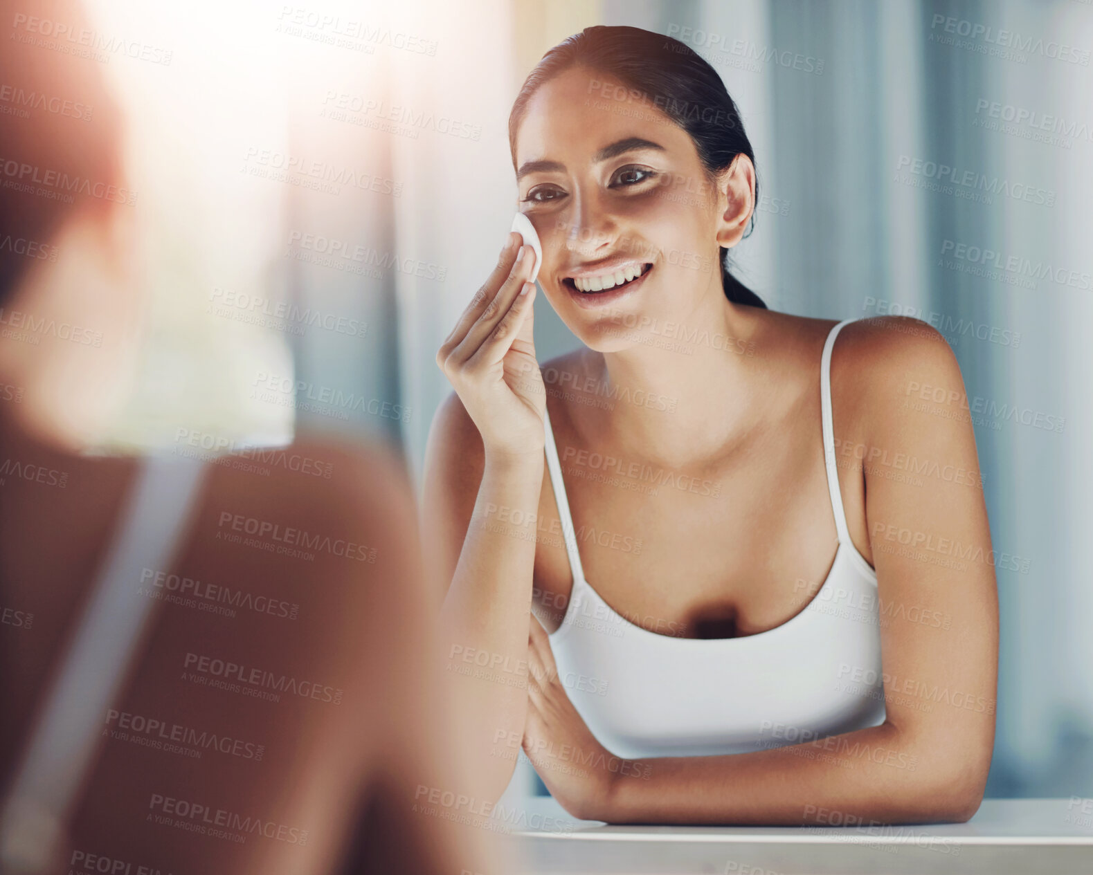 Buy stock photo Woman, mirror and cotton pad in bathroom for skincare, toner and cleaning acne or pimple breakout. Female person, reflection and skin in house for facial treatment and dermatology after microneedling