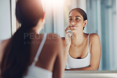 Buy stock photo Woman, mirror and touch face in bathroom for skincare, results and beauty or cleaning. Female person, reflection and skin in house for facial texture and dermatology after microneedling aftercare