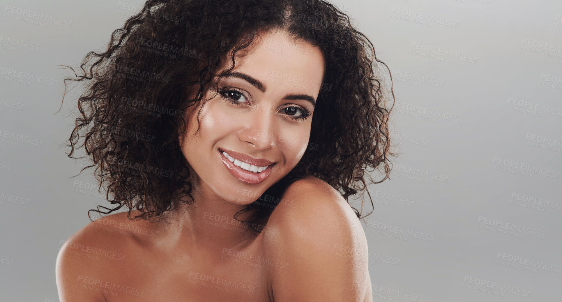 Buy stock photo Portrait, skincare and woman with beauty, shine and dermatology on grey studio background. Face, happy person and model with glow, texture and aesthetic with smile, makeup and wellness with cosmetics