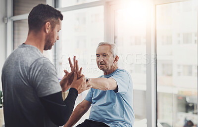 Buy stock photo Physiotherapy, elderly man and hand with stretching for recovery, support and strength in retirement. Patient, care and people with muscle exercise for help, joint pain or rehabilitation in arthritis