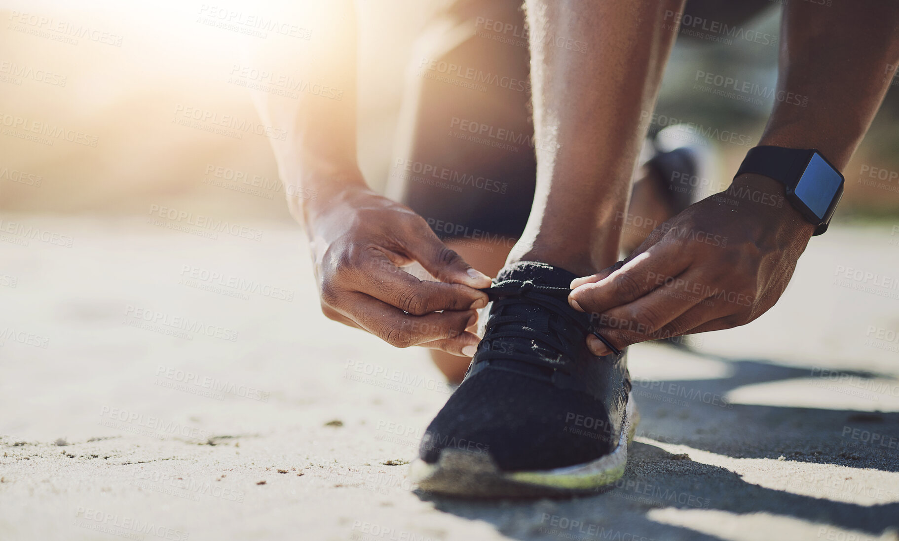 Buy stock photo Hands, black man and sneakers with laces outdoor for fitness support, reading and running exercise of marathon. African, male athlete and sports shoes for workout, training and morning adventure