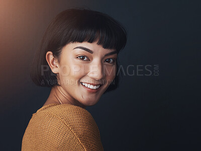 Buy stock photo Portrait, smile and woman in studio for hair style isolated on black background mockup space. Face, happy girl and confident hairdresser at salon for beauty cosmetics, makeup and hairstylist in Spain