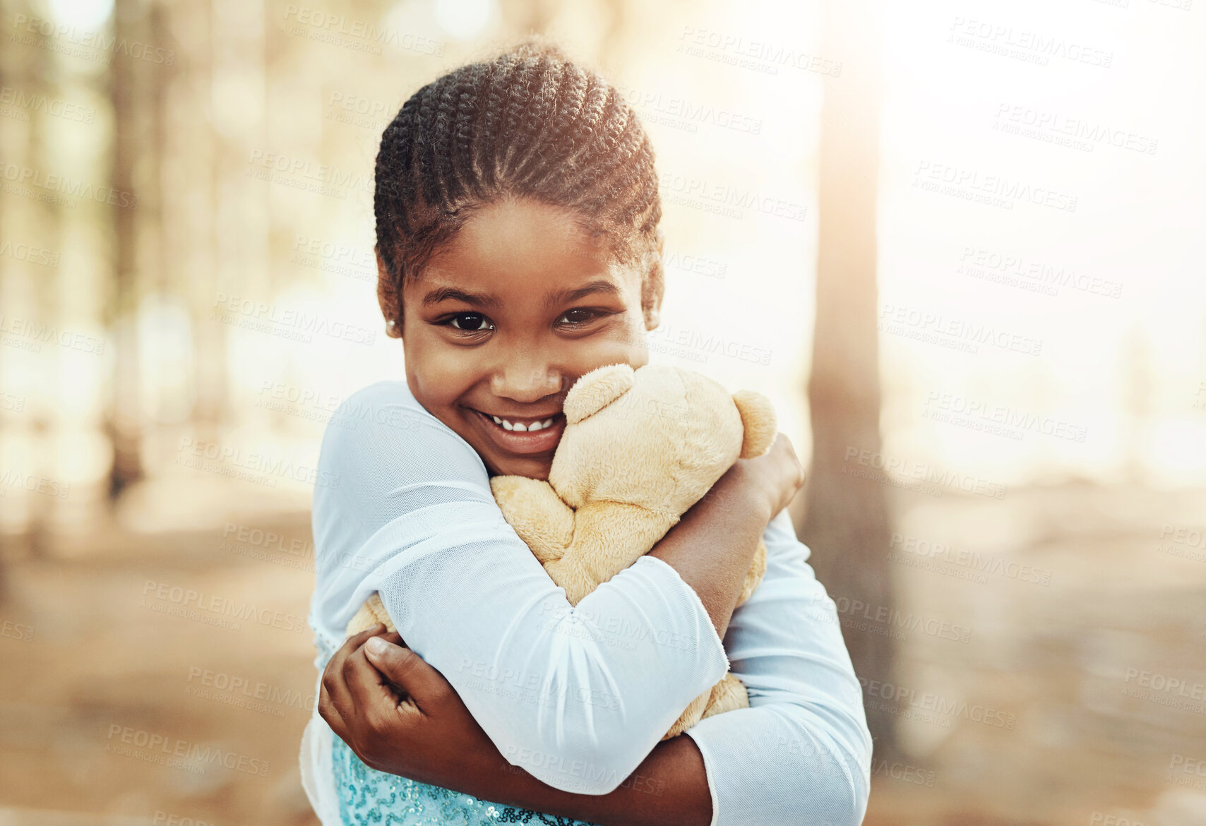 Buy stock photo Portrait, hug or child with teddy bear in forest for love, orphan or toy for support, therapy healing or play. Mexican girl, nature or stuffed animal with happiness, kid and donation gift for game