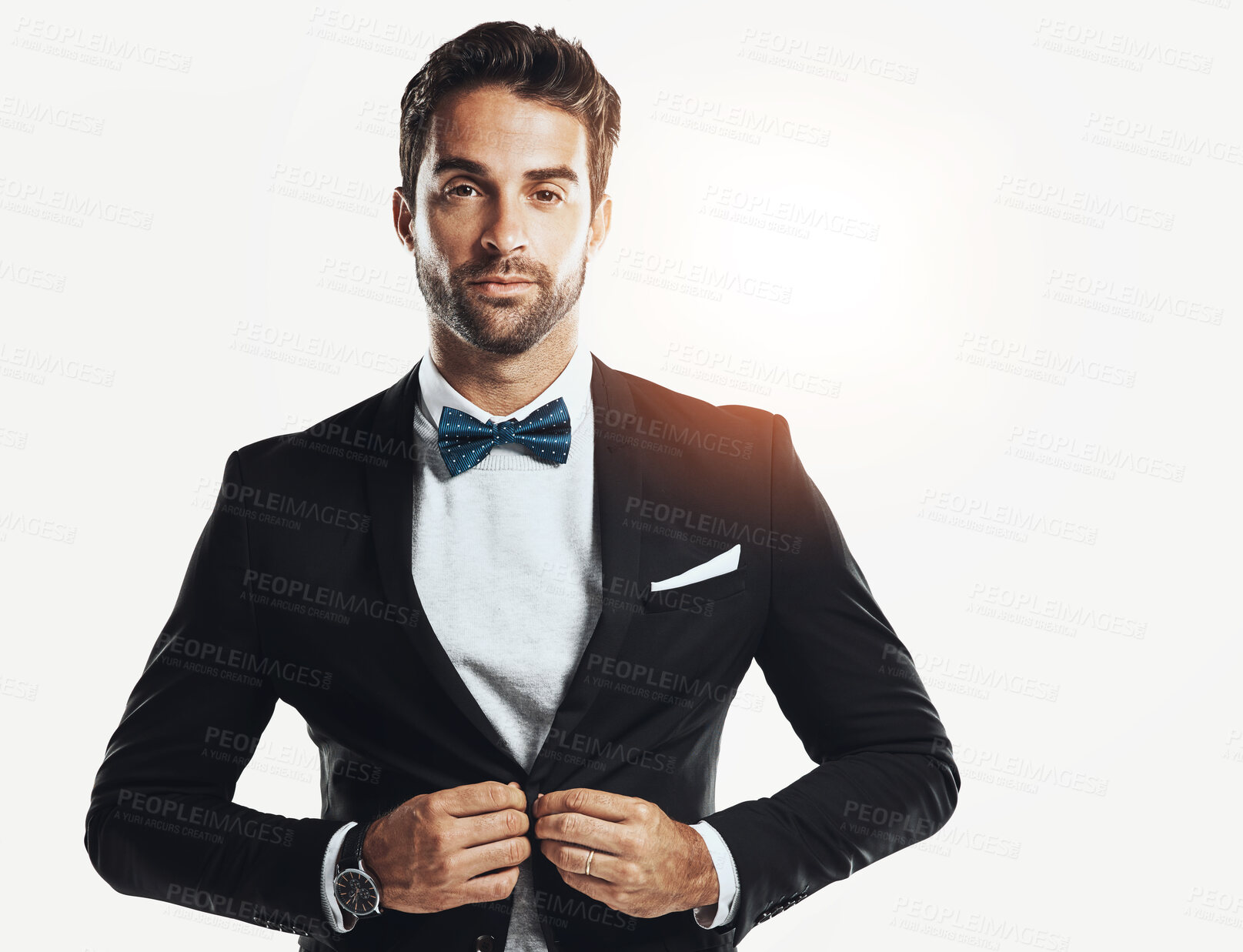 Buy stock photo Fashion, bowtie and portrait of man in studio with elegant, luxury and classy tuxedo for wedding. Style, handsome and confident male person from Canada with suit for black tie by white background.