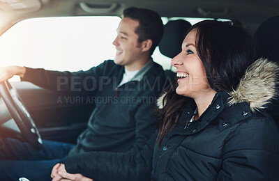 Buy stock photo Winter, driving and couple in car for road trip, adventure and vacation holiday with happiness in Canada. Married people, man and excited woman for destination approach, love and bonding in vehicle