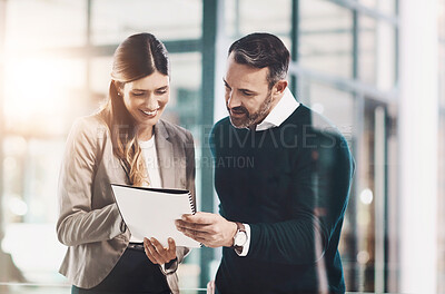 Buy stock photo Business people, talking or portfolio in modern office for teamwork, partnership or collaboration. Documents, paperwork and manager in discussion with assistant for feedback, planning and project