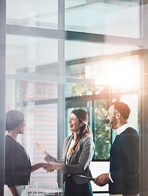 Buy stock photo Business meeting, welcome and people in office with handshake for partnership, greeting or collaboration. Lens flare, diversity and employee with client shaking hands for deal, b2b or agreement