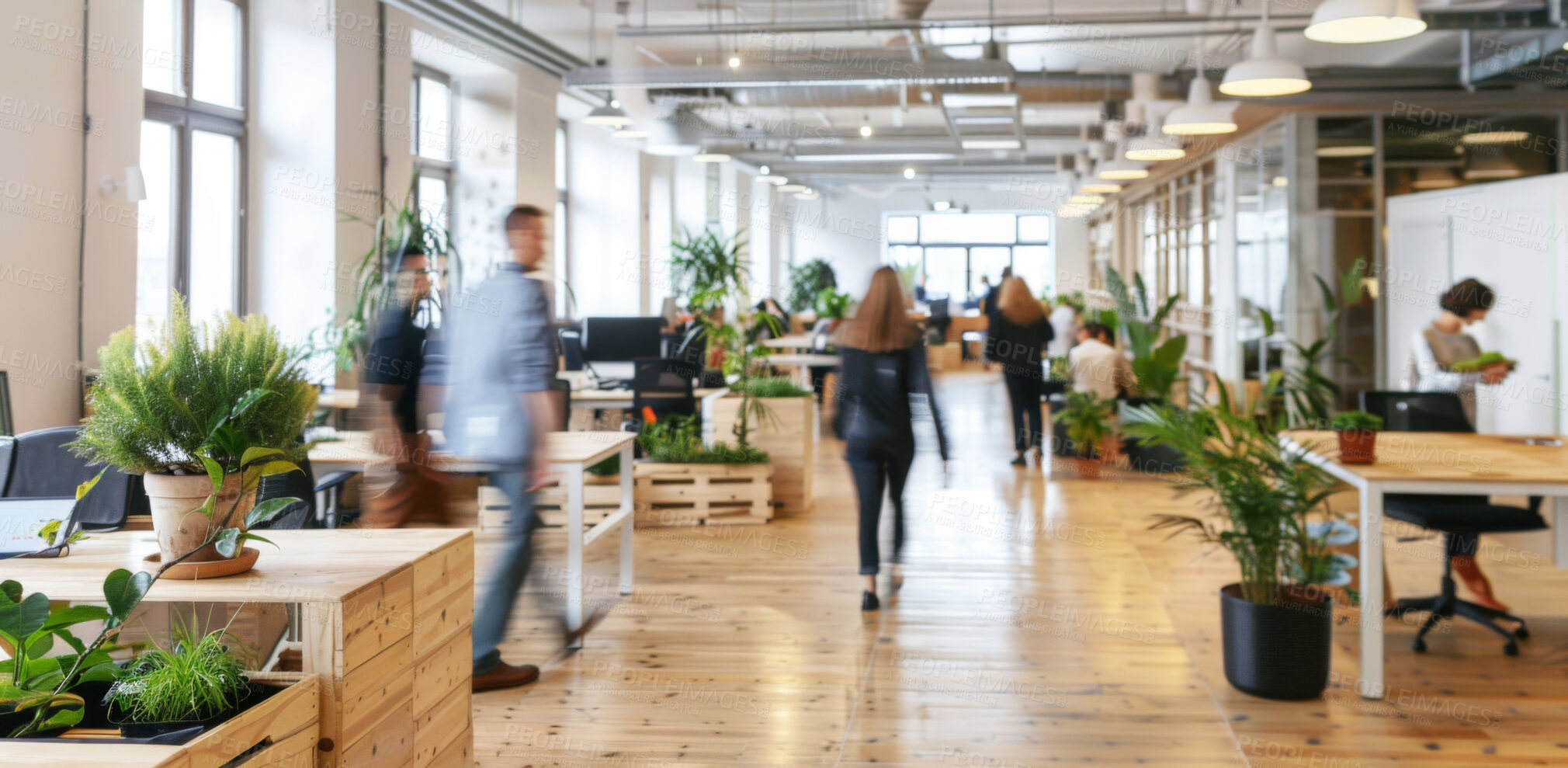 Buy stock photo Lobby, busy and business people walk in office, company and startup with tech on wood desk. Blur, motion or group in coworking space for sustainability, workflow or workspace with eco friendly plants