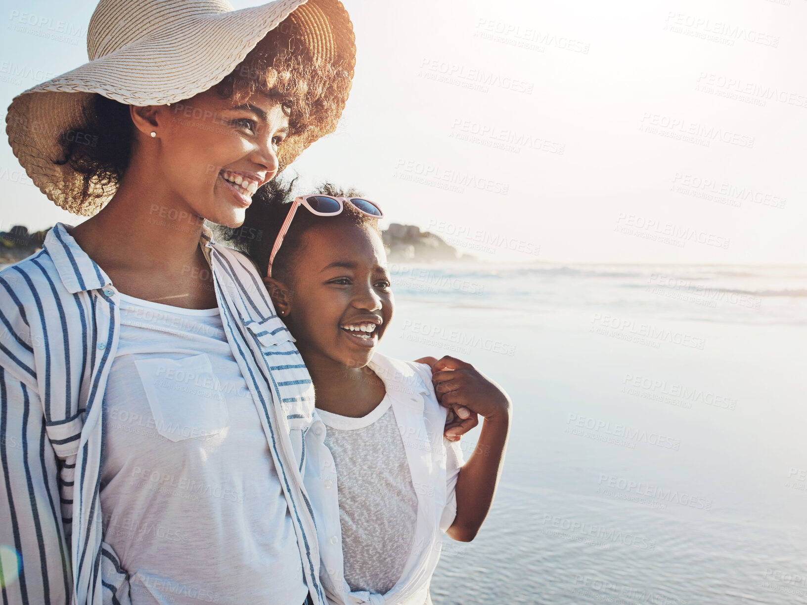 Buy stock photo Mom, daughter and hug on beach for holiday, vacation and travel together with outdoor bonding for mothers day. Excited African family, woman and child sightseeing, tourism and love for weekend away