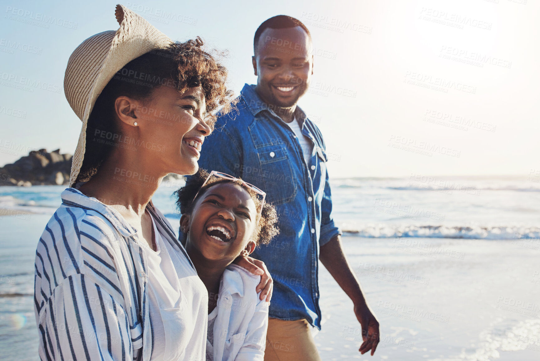 Buy stock photo Black family, parents and girl at beach, space and mockup with bonding, walk and people in sunshine. Father, mother and daughter with joke, laughing or excited by ocean with funny memory on vacation