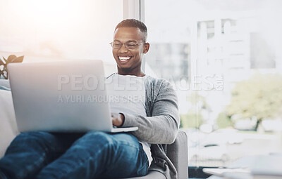 Buy stock photo Relax, typing and black man with laptop on sofa for remote work, email or communication in living room, Online, illustrator and person for freelance career, browsing internet or proposal in home