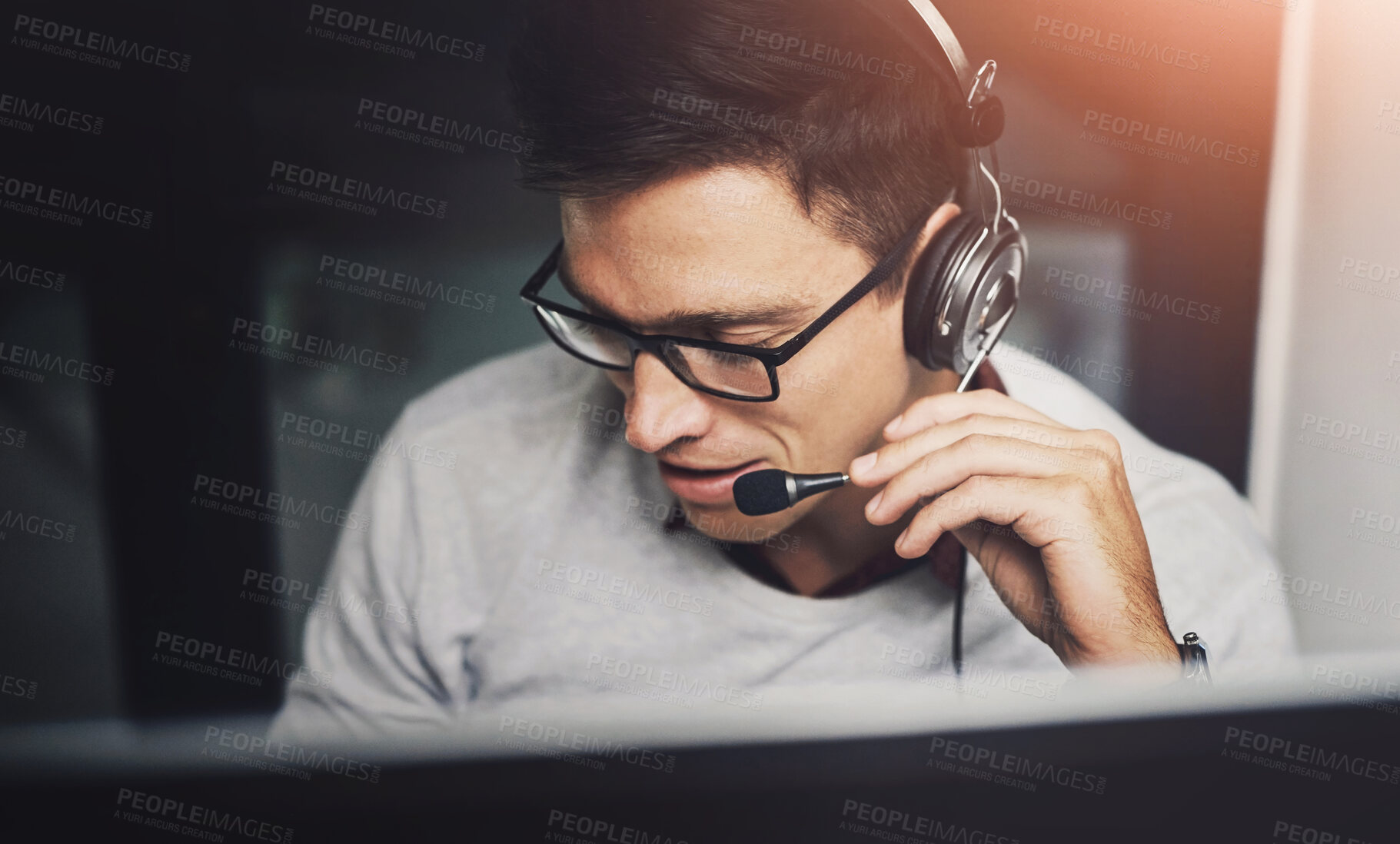 Buy stock photo Business man, agent and night call center for customer support, helping and software troubleshooting on computer. Consultant talking with headphones for e commerce or information technology solution