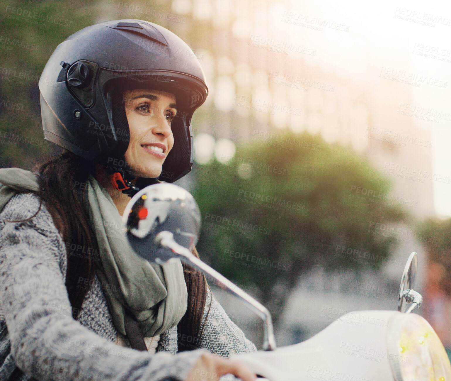 Buy stock photo Travel, transport and woman on scooter in city for driving, commute and traffic on street or road. Driver, lens flare and person with helmet protection on vehicle for adventure, journey and trip