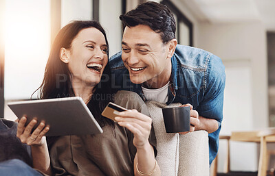 Buy stock photo Online shopping, tablet and happy couple on sofa with credit card, coffee and savings for home budget. Fintech, woman and man on couch with smile, financial freedom and digital app for payment plan.