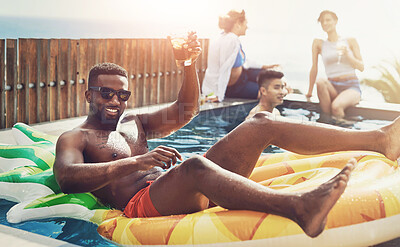 Buy stock photo Holiday, relax and man in pool with drink, smile and sunglasses in water at social event in Miami. Travel, party and happy people swimming at hotel with cocktail, celebration and fun summer vacation