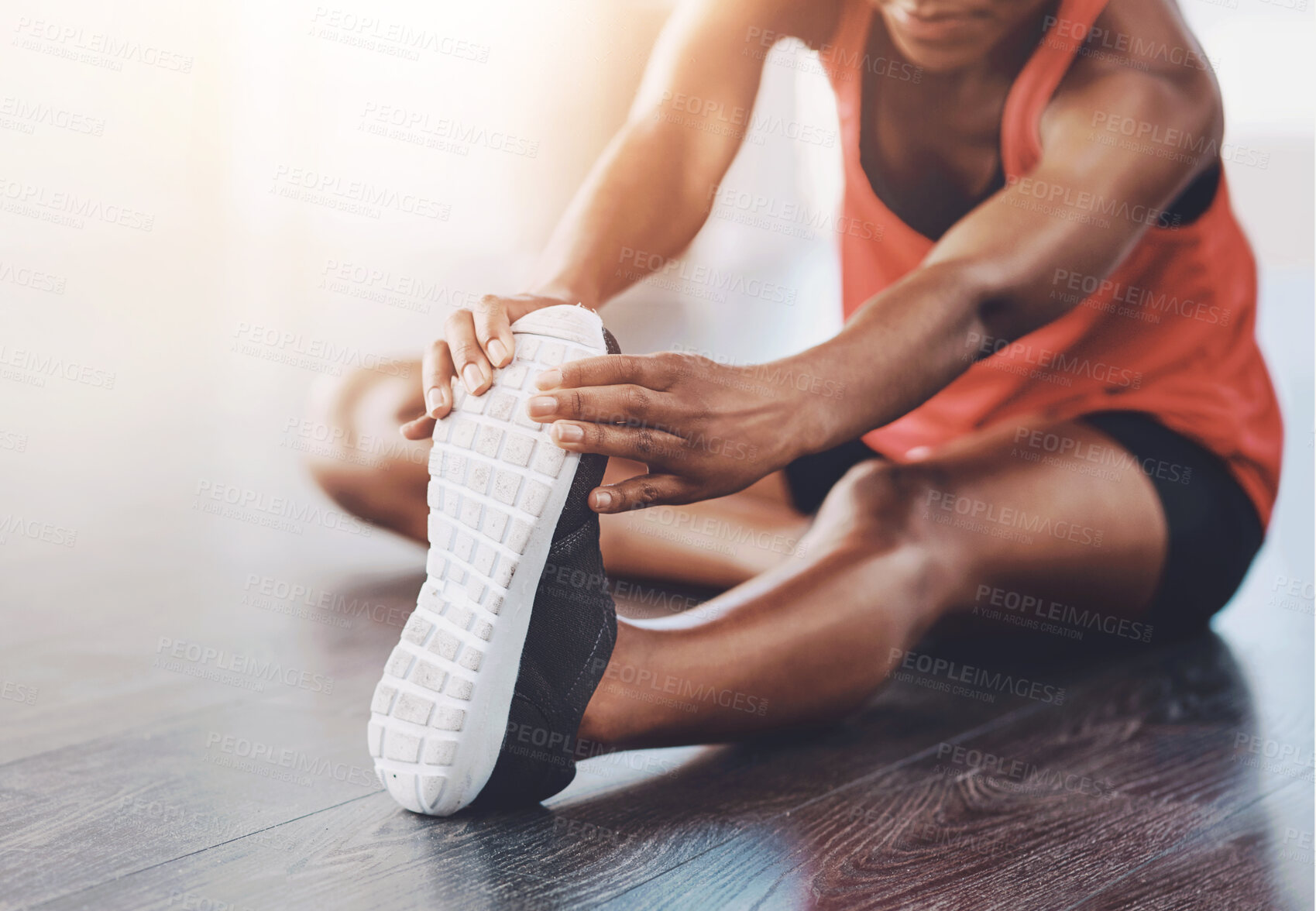 Buy stock photo Fitness, gym and woman stretching leg on floor for morning workout, wellness routine or warm up. Active, athlete and female person on ground for muscle flexibility, cardio exercise or getting ready