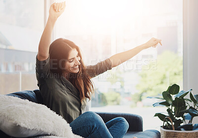 Buy stock photo Dance, woman and sofa for relax and fun in home, music and playlist for streaming on weekend. Online, audio or freedom in living room with lens flare for female person, song and internet subscription